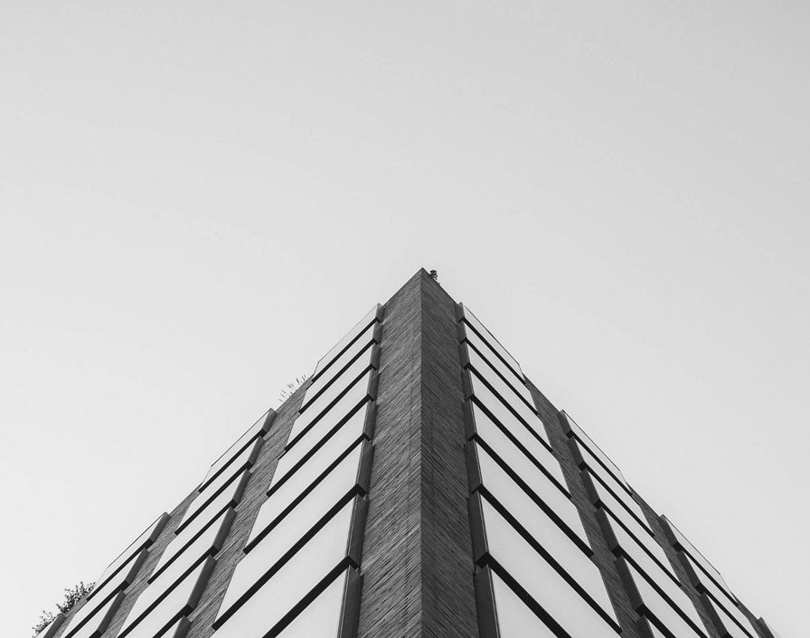 Looking up the corner of a city office tower
