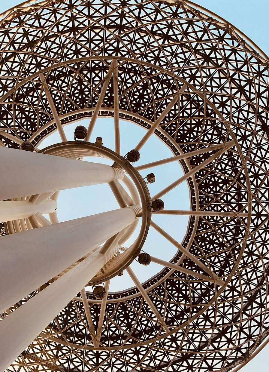 The engineered underside of a domed structure
