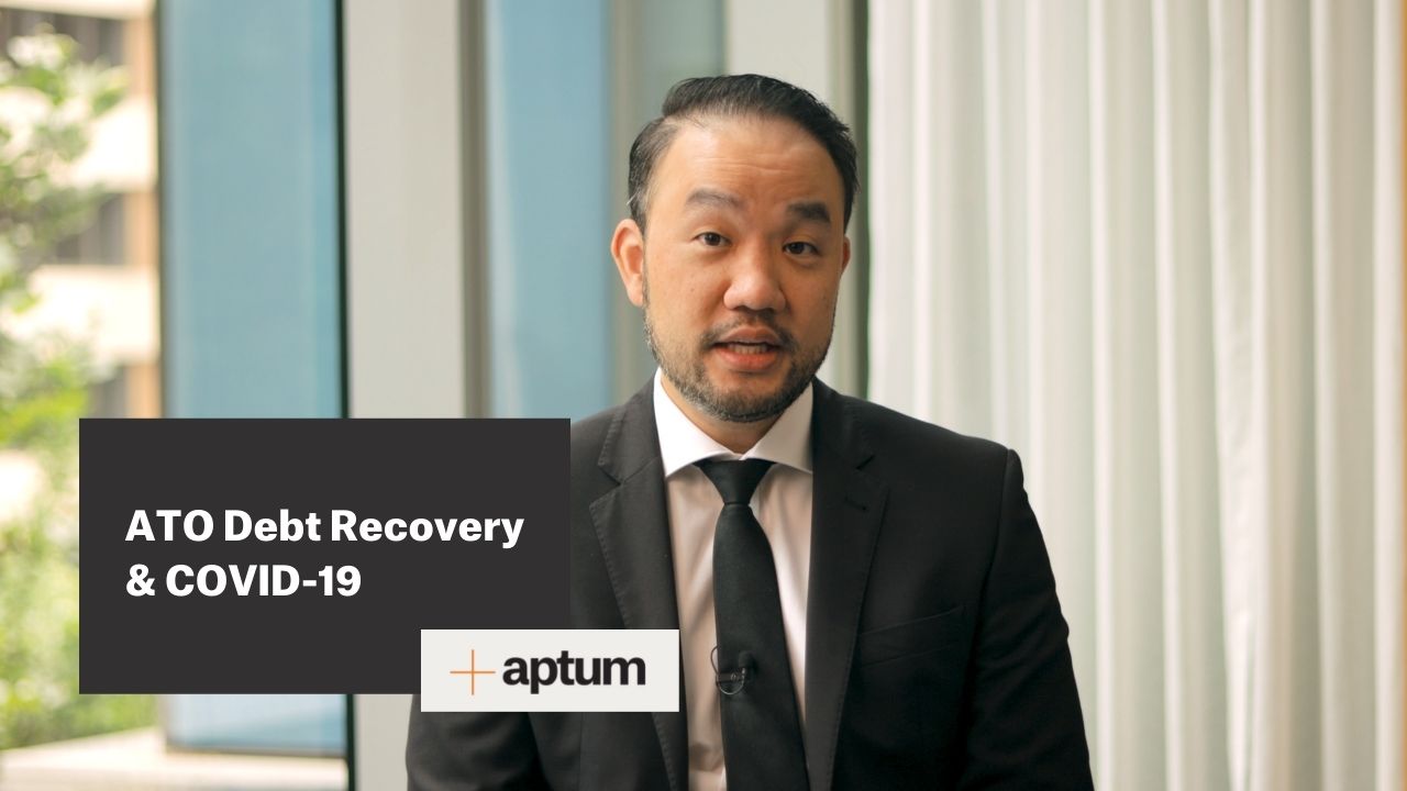 Aptum Practice Lead (Tax Disputes) Tuan Van Le speaking to camera with title card bottom left reading 'ATO Debt Recovery & COVID-19'